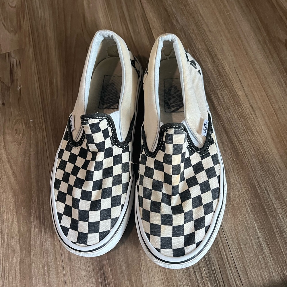 Checkered vans slip on